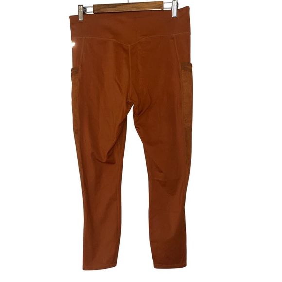 Fabletics XL Trinity Motion 365 Mid Rise 7/8 Leggings burnt orange Triple Pocket - Picture 2 of 5